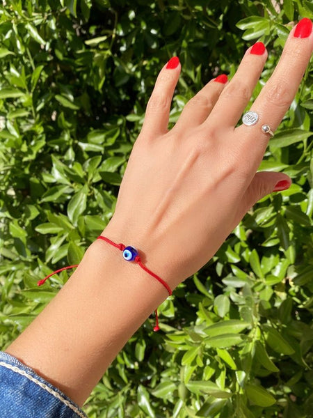 thumbnail image 2 of Handmade Evil Eye Bracelet On Red String With Goldtone Beads - 2 Blue & 2 Red Eyes 2 of 5