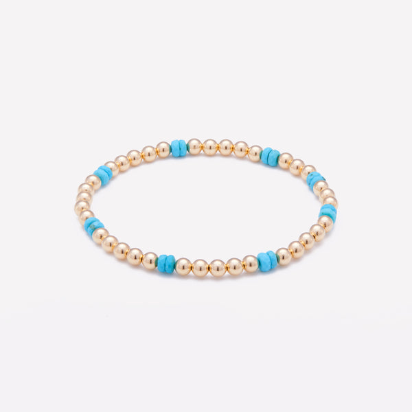 Yellow gold beaded bracelet with turquoise nuggets for women