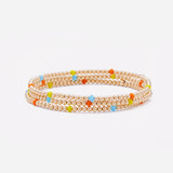 Yellow gold beaded bracelet with rainbow crystals stack for women