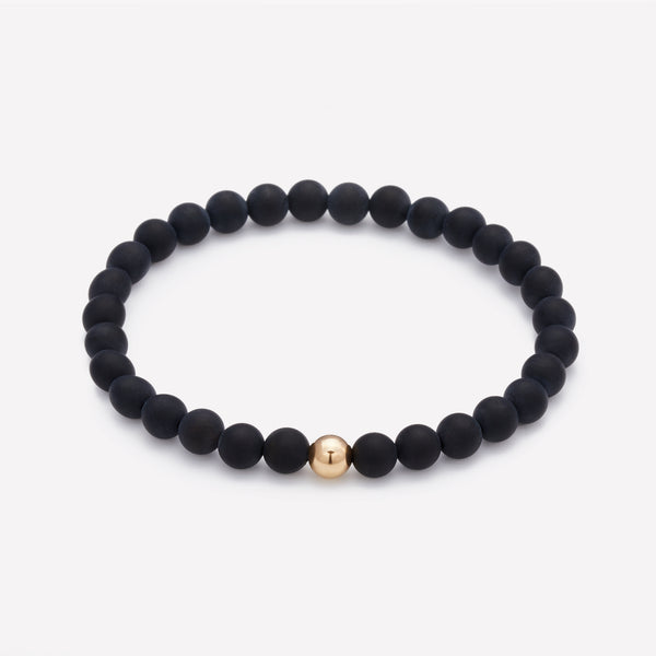 Matte onyx beaded bracelet with yellow gold bead for men