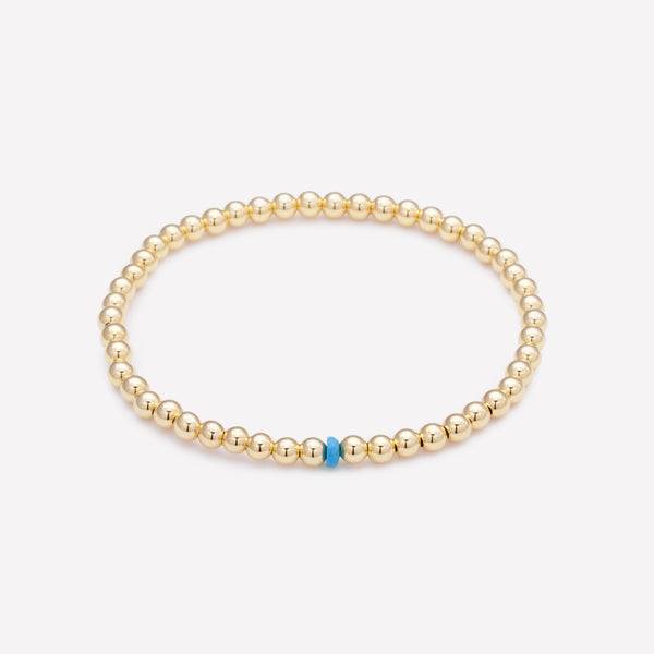Yellow gold beaded anklet with single turquoise crystal for kids
