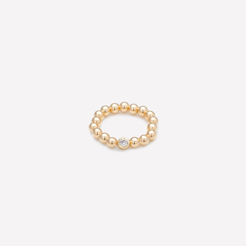 Yellow gold beaded bracelet with single gold plated Zirconia for women