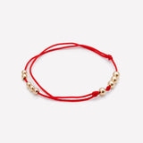Red silk string bracelet with yellow gold beads for men and women