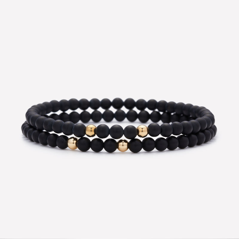 Matte onyx beaded bracelet with double yellow gold beads stack for men