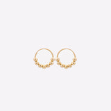 Yellow gold small hoop earrings with gold beads for kids