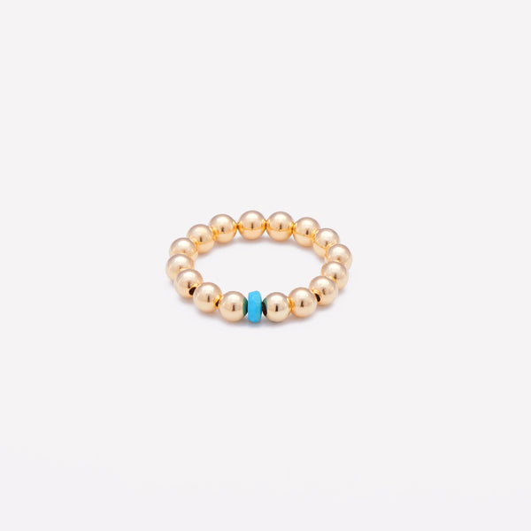 Yellow gold beaded ring with single turquoise nugget for women